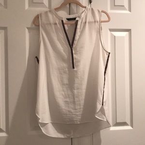 White sleeveless blouse